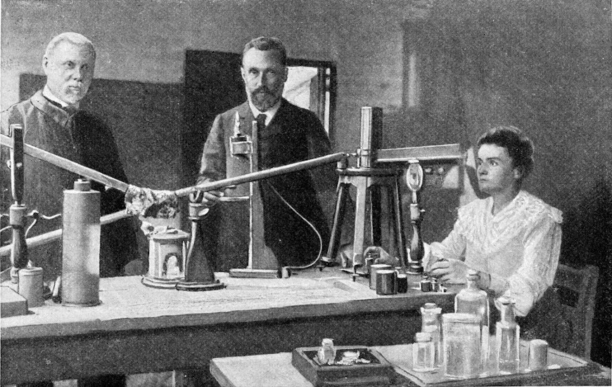  IlustraÃ§Ã£o de Pierre e Marie Curie em seu laboratÃ³rio, na FranÃ§a.